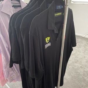 Black Polo Shirt with custom company logo. These were work shirts.